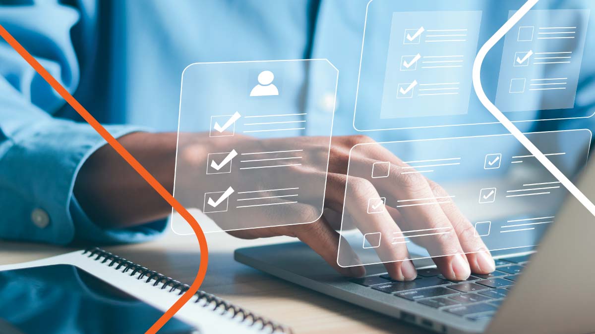 A person on laptop with a holographic screen.